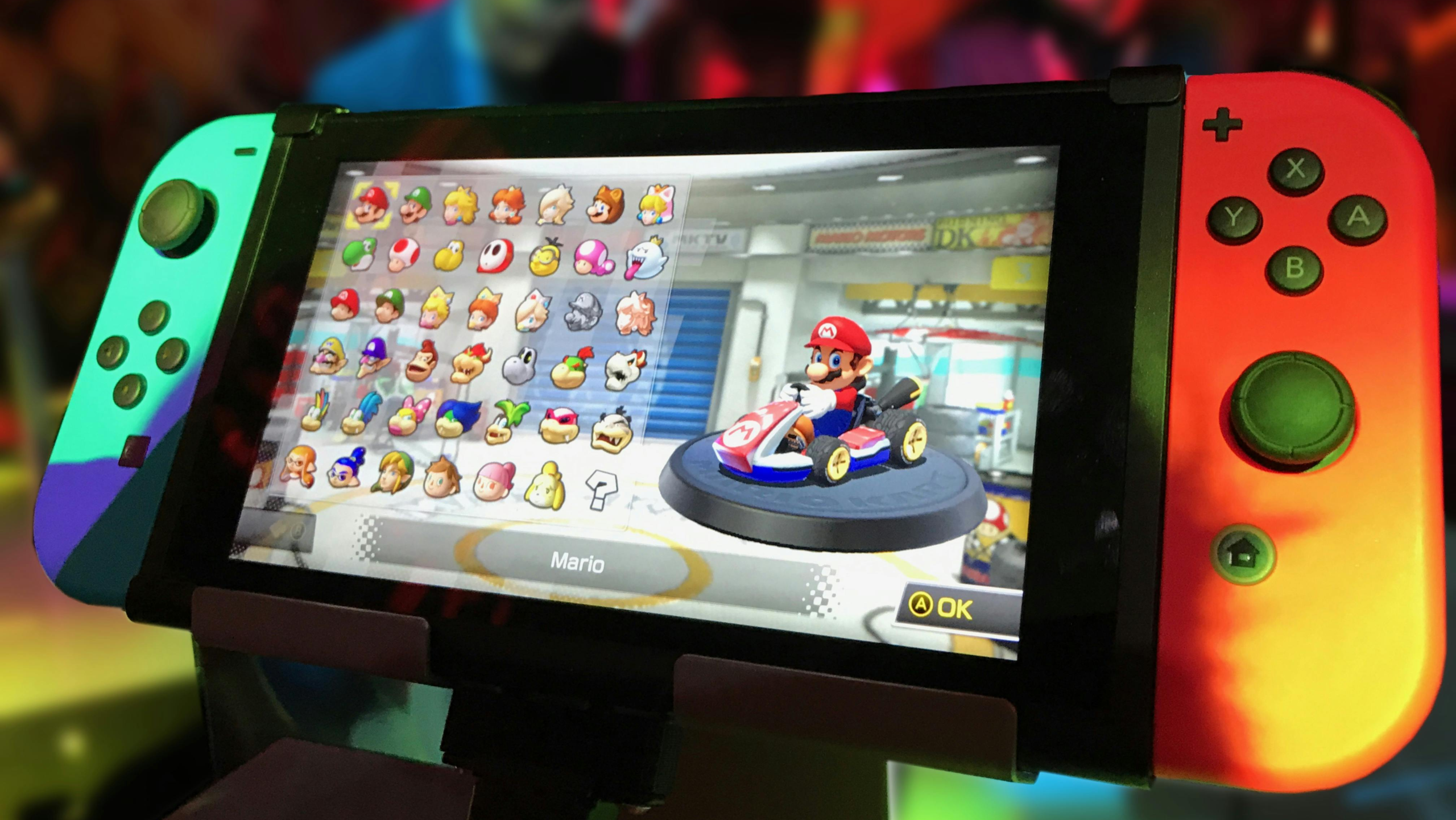 Nintendo Switch screen showing Mario Kart character selection with Mario highlighted during gameplay.
