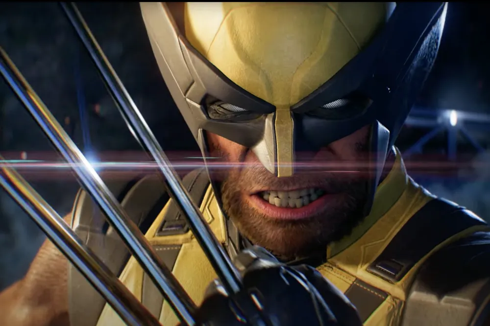 Close up of Wolverine in the Marvel’s Wolverine PS5 game, showing his claws extended and his suit lit by cinematic effects.