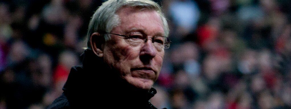 Sir Alex Ferguson applauding during a Manchester United match at Old Trafford