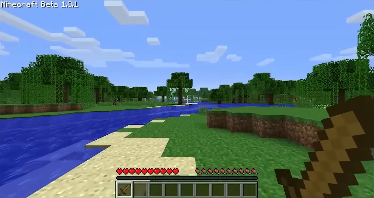 Early Minecraft beta gameplay showing a river landscape and survival interface.