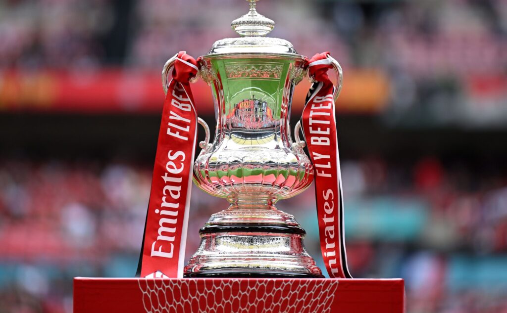FA Cup trophy with Emirates ribbons displayed ahead of a final match